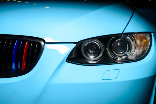 Blue,car,with,headlight,,grille,and,bumper